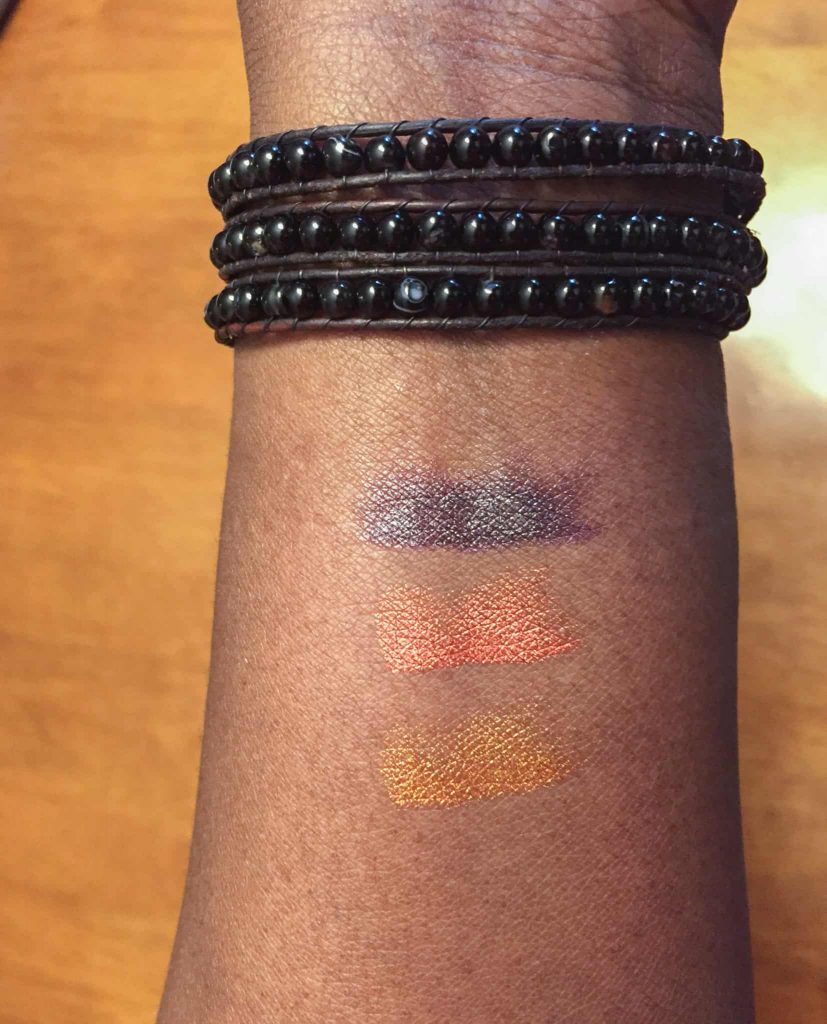 Handmade Lipstick from black-owned cosmetic brand swatched on dark skin