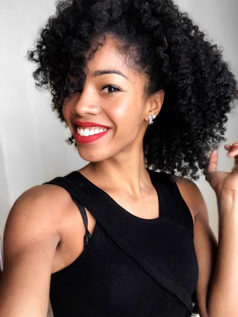 Stila Cosmetics Dolce on top of Beso Stay All Day Liquid Lipstick on Black Woman with Twist Out