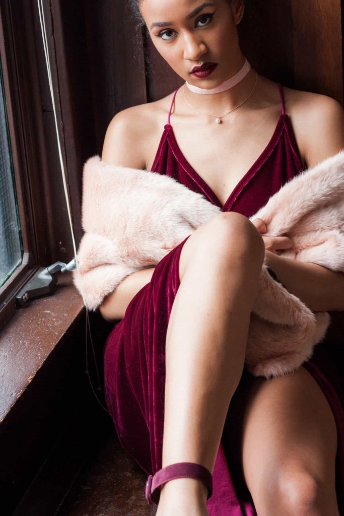 Elegant Wine velvet dress, pink choker, and faux-fur shawl. Elegant outfit for a fancy dinner or gala