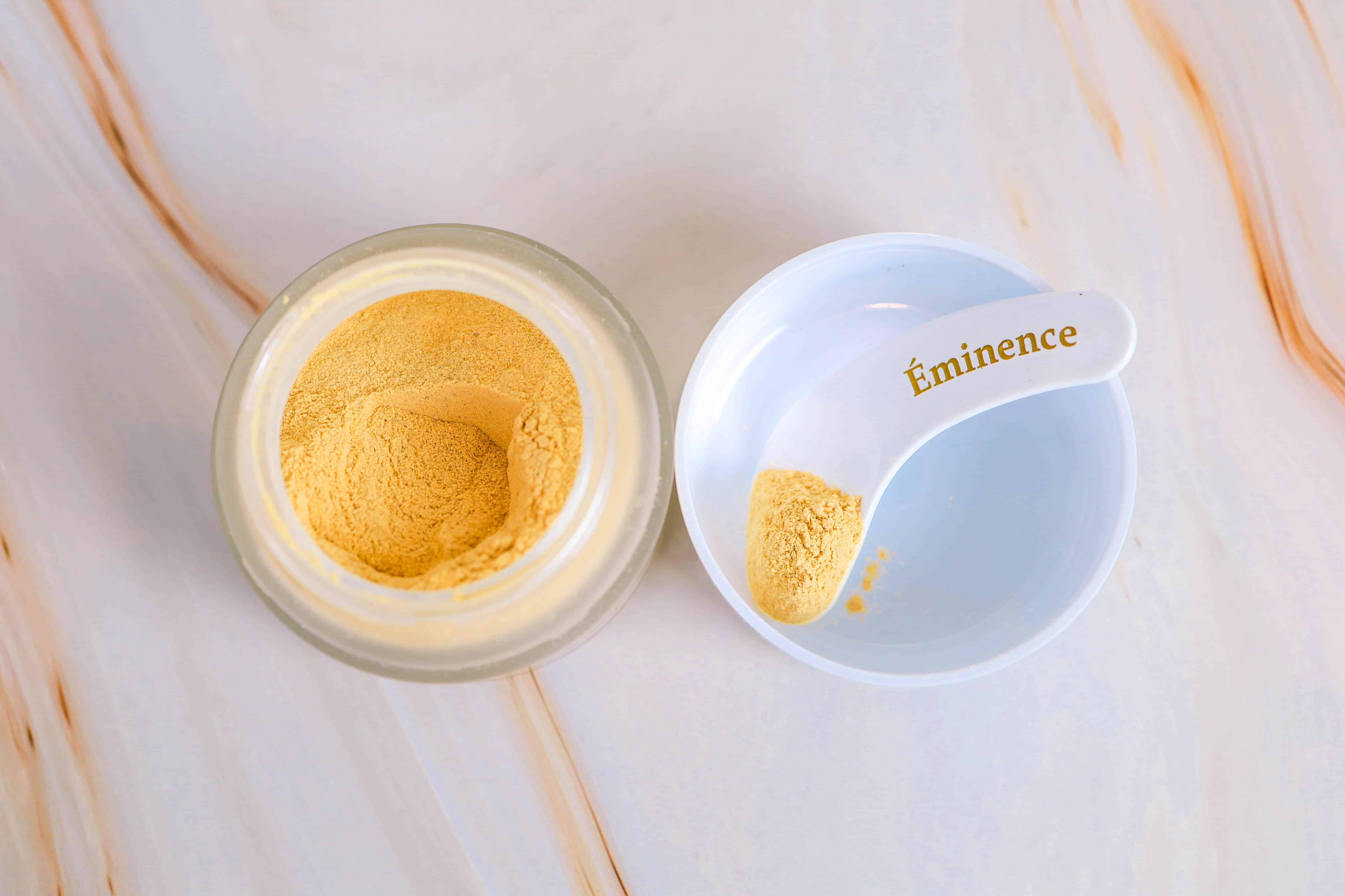 Eminence Turmeric Energizing Treatment. Transformative warming powder with Citrine Gemstones.