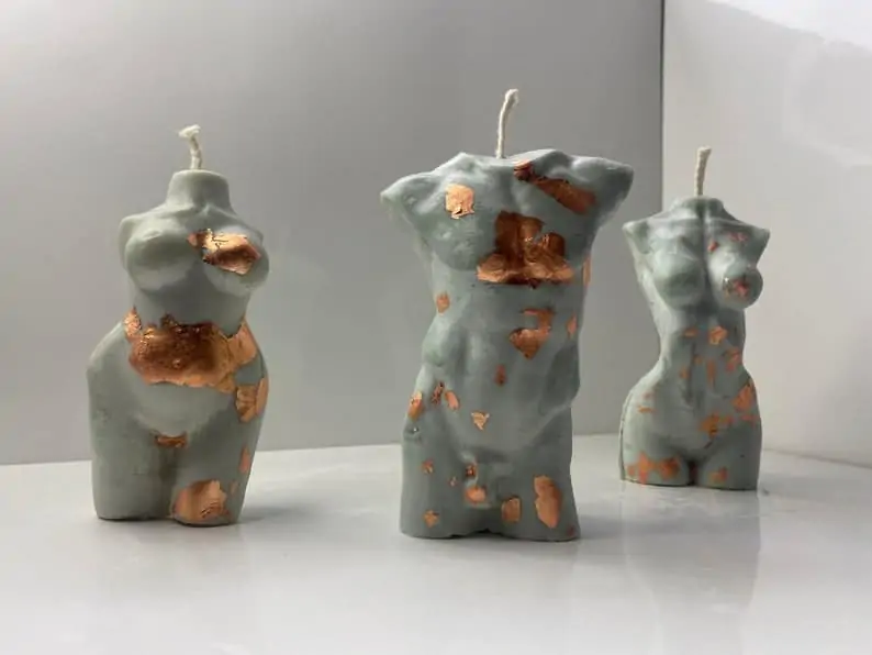 O'Chan Made | Male Torso/Female Body shaped candles with rose gold flakes | Black Owned Candle Companies