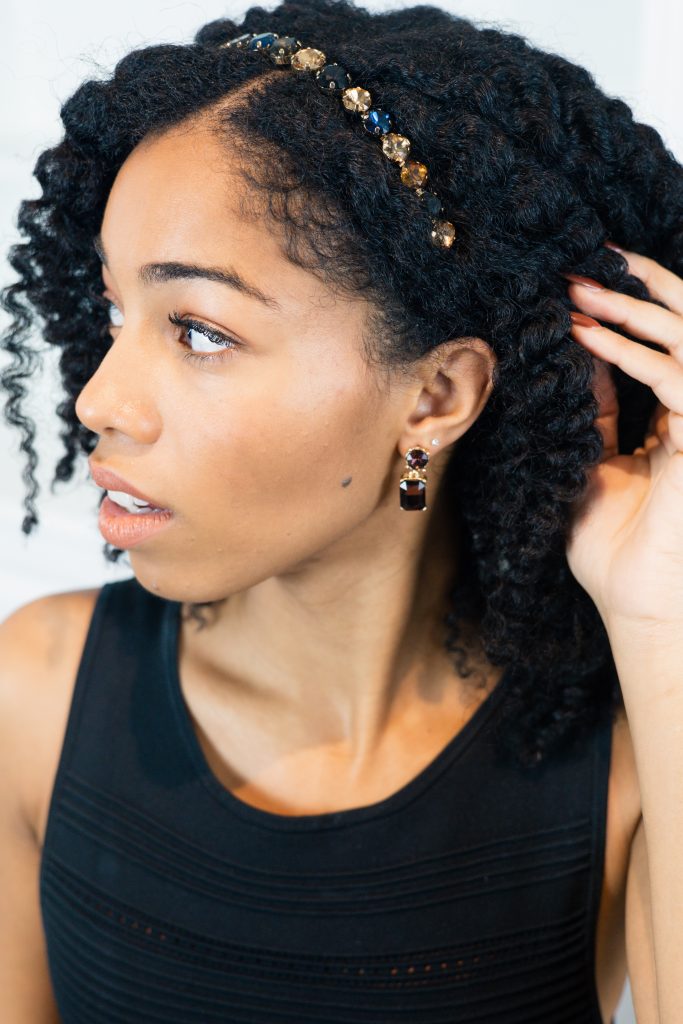 Natural hair styled in twistout with jewelled headband